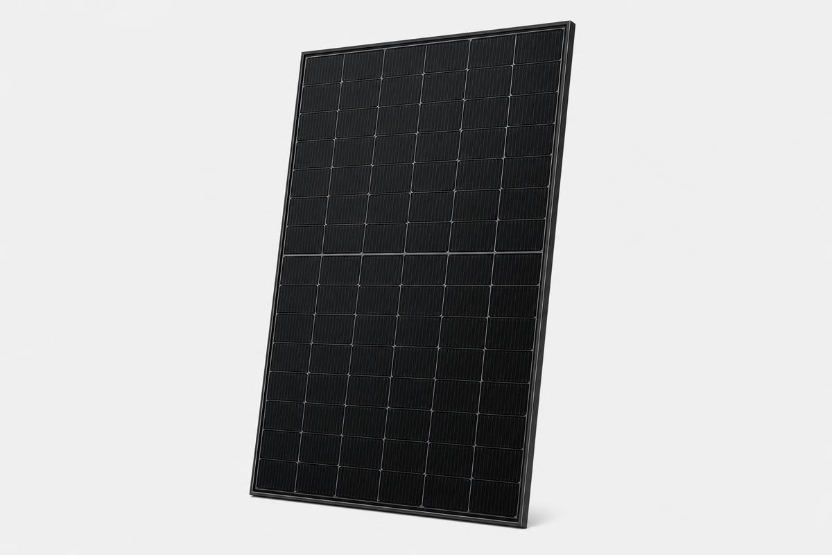 Modern all-black solar panel photographed on a neutral studio background